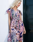 Jurk in flower design met roezelmouw