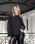 Zwarte blouse met plooien